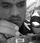 An innovator working on the mobile phone switch project