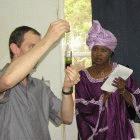 A genetic engineer shows his work to a journalist in Niamey, Niger