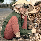 Woman peeling cassava in Vietnam