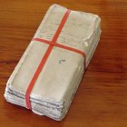 Documents tied with red tape