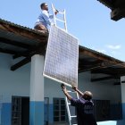 Putting up solar panels in Tanzania Putting up solar panels in Tanzania