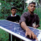 Men with solar panels in Sri Lanka