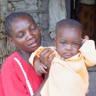 Tanzanian mother holding her child