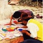 Doctors preparing a mandala (sacred diagram) for the 'empowering the medicine' ritual, Lhasa, Tibet.