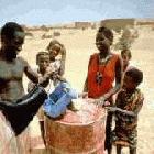 Collecting rationed water in Mali in 1993