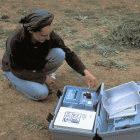 Tunisian researcher measuring levels of iron in lake water