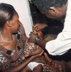 A child receives a dose of vitamin A