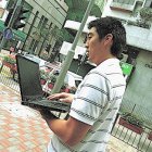 Man using wifi in the street