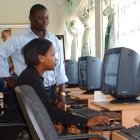 computer room, teacher and pupil