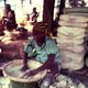Woman processing cassava